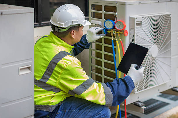 Professional Ductwork Repair technician working in Dike, TX